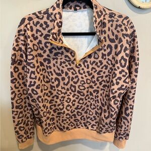 Boutique style Leopard print quarter zip pullover.